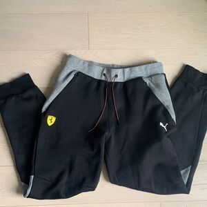 Puma Black and Gray Joggers with Yellow Emblem